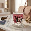Girls Trip candle with raspberry glam label on a boutique hotel vanity with travel accessories