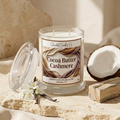 Cocoa Butter Cashmere candle with fabric-fold label styled with coconut, vanilla and jasmine