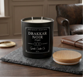 Drakkar Noir candle with Scandal Candles Co. boutique label in an elegant leather-lounge setting
