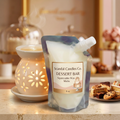 Dessert Bar squeezable wax melt pouch with cream caramel and blush label in a warm bakery setting