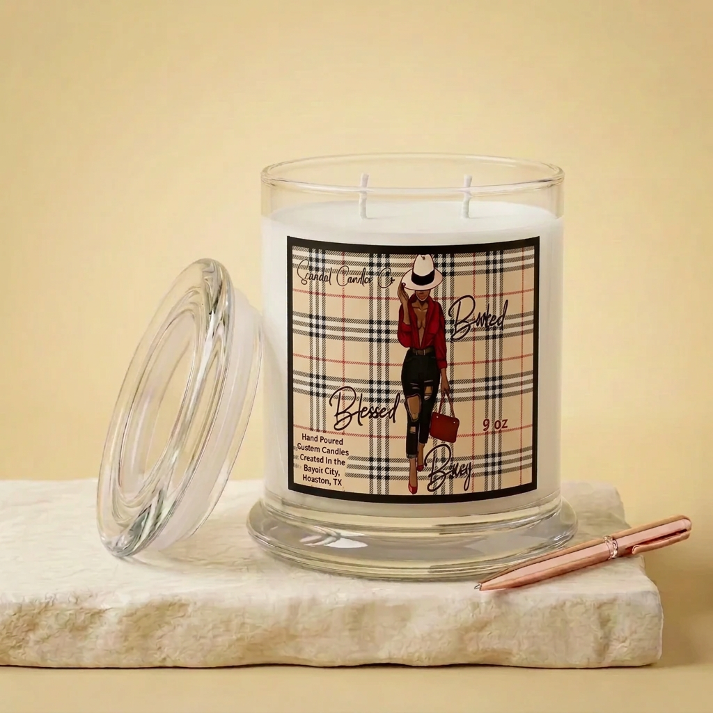 Blessed, Booked & Busy 9 oz candle with beige check-pattern label, studio view with glass lid and rose-gold pen