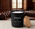 Envy (Type) boutique-label candle and bamboo lid in a leather lounge