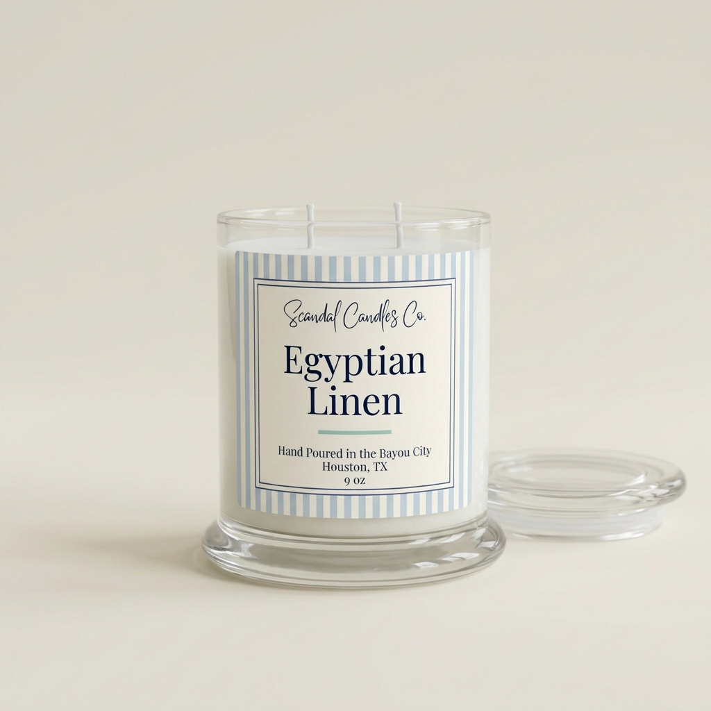 Egyptian Linen candle with striped spa label on an ivory studio background